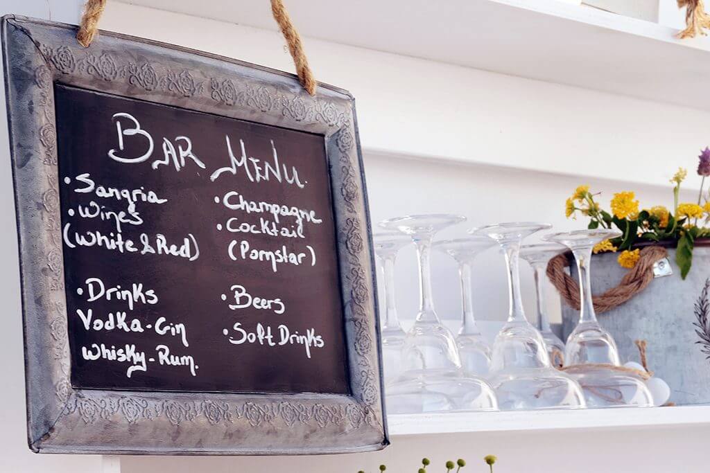 Destination wedding in island paros Bar sign